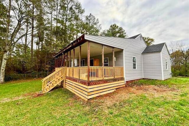 exterior space featuring a front lawn