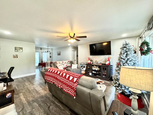 living room with ceiling fan, dark hardwood / wood-style flooring, and french doors