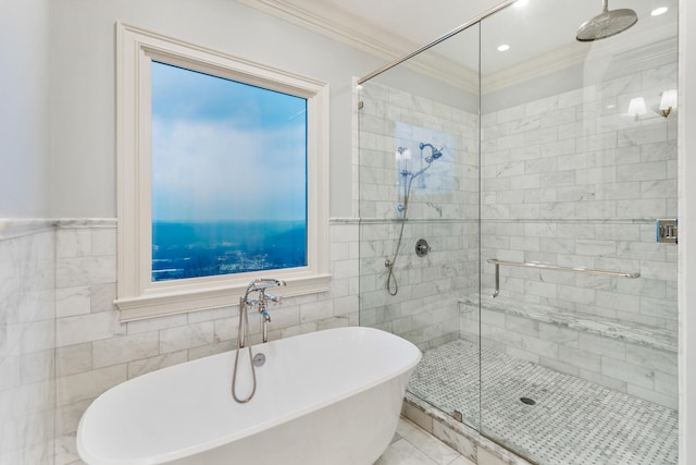 bathroom featuring separate shower and tub, ornamental molding, and tile walls