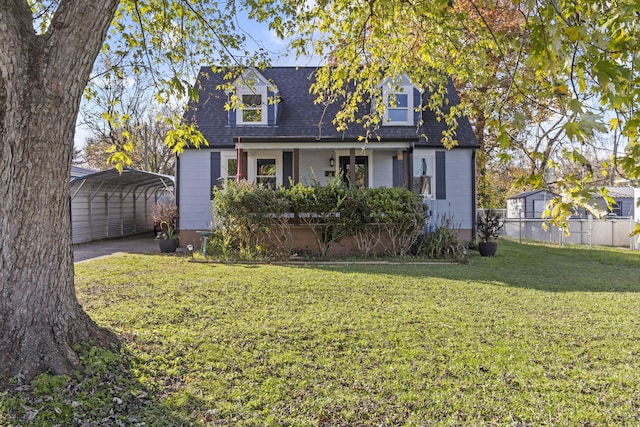 new england style home with a carport and a front yard