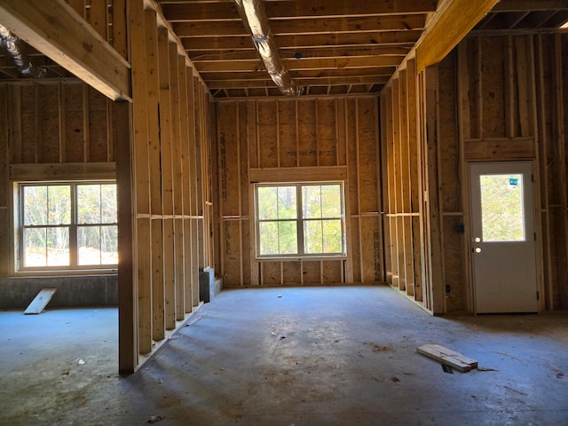 misc room with a towering ceiling