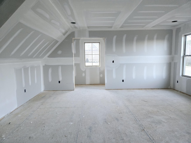 additional living space with vaulted ceiling