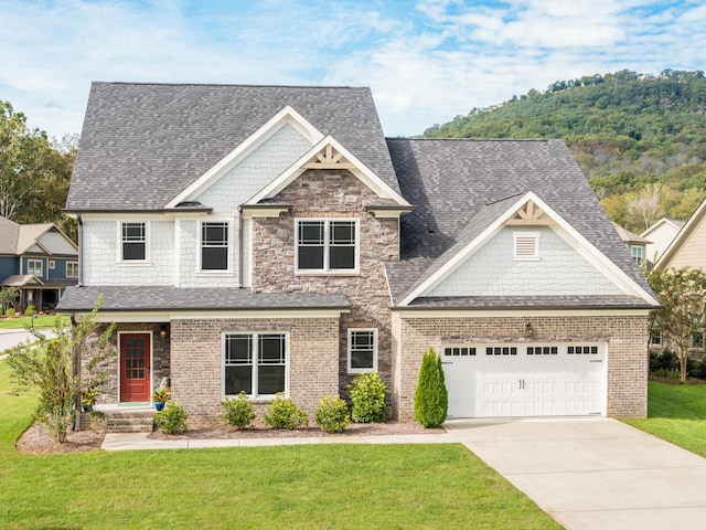 craftsman-style house with a front yard