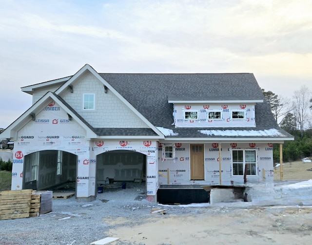 property in mid-construction with covered porch