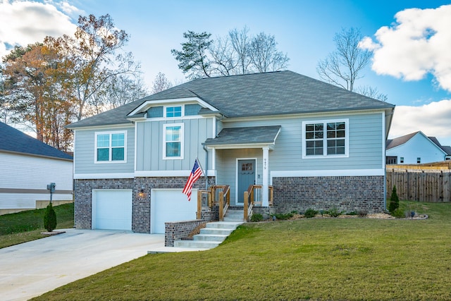 view of front facade with a front yard and a garage