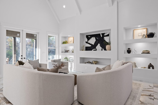 living room featuring built in features, high vaulted ceiling, a healthy amount of sunlight, and french doors