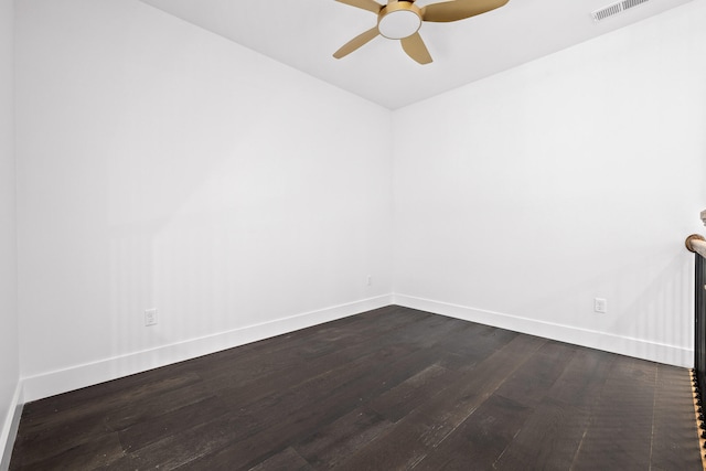 empty room with hardwood / wood-style floors and ceiling fan