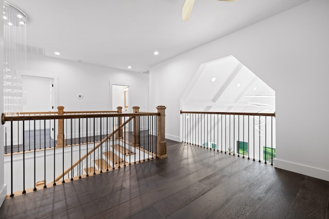 hallway featuring dark hardwood / wood-style flooring