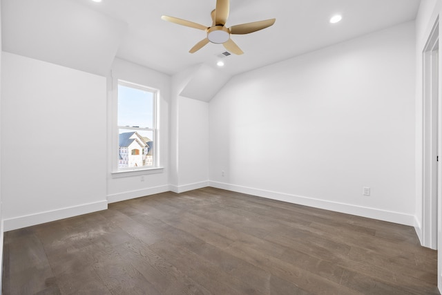 bonus room featuring ceiling fan and dark wood-type flooring