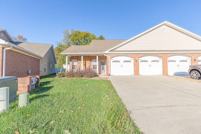 view of front of house featuring a front yard and a garage