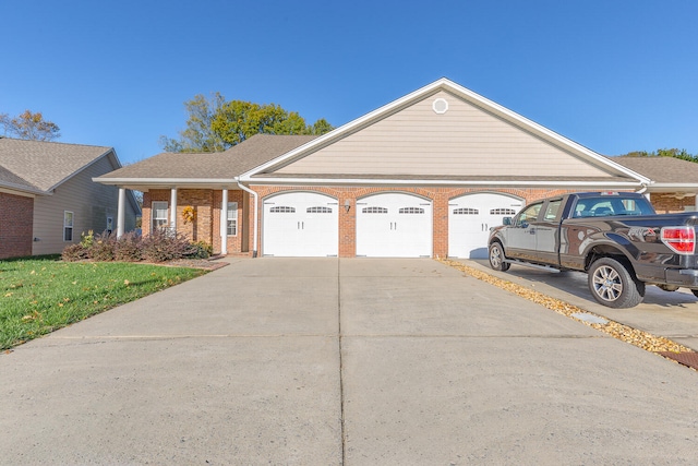 ranch-style home with a garage