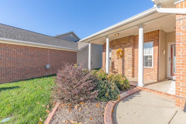 entrance to property featuring covered porch