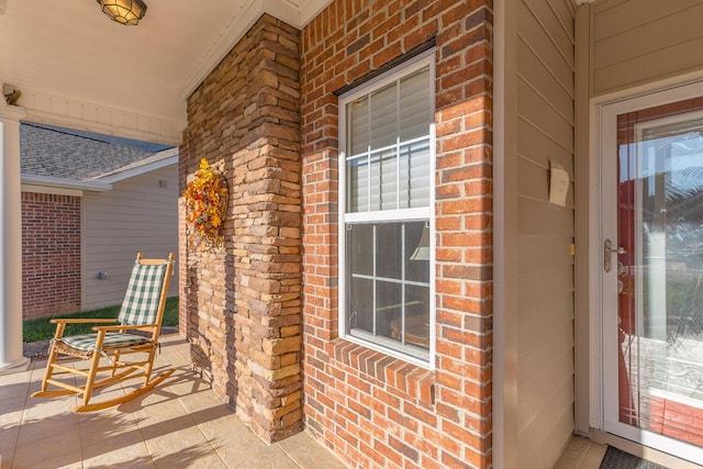 6315 Laramie Cir, Chattanooga, TN 37421 - view of exterior entry featuring a porch and brick siding