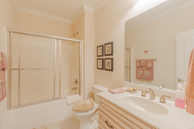 full bathroom with vanity, crown molding, shower / bath combination with glass door, tile patterned flooring, and toilet