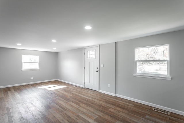 foyer entrance with hardwood / wood-style flooring