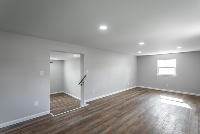 basement with dark wood-type flooring