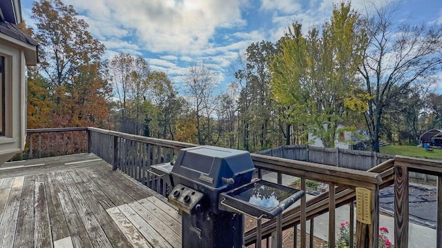 wooden deck with grilling area