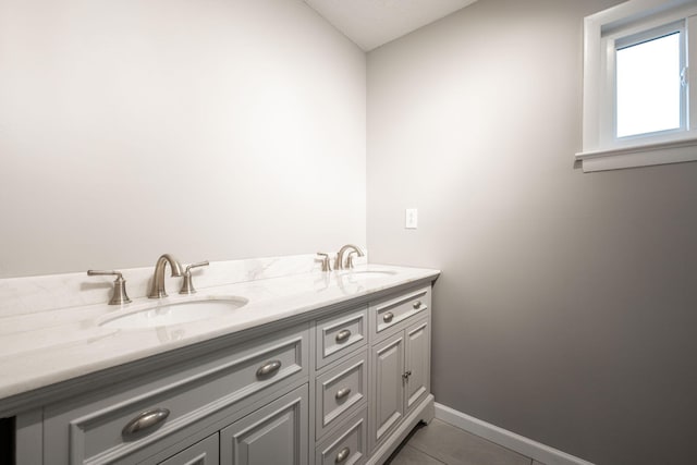 bathroom with vanity and tile patterned flooring