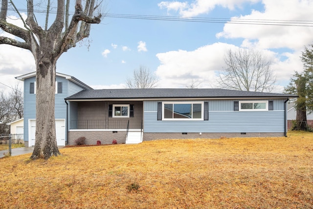 view of front facade featuring a garage and a front yard