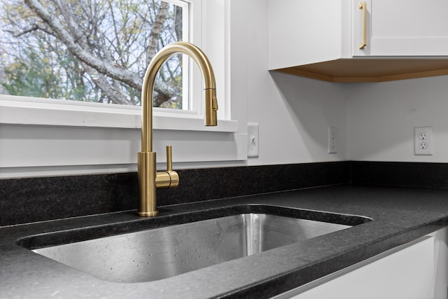 details with sink and white cabinets