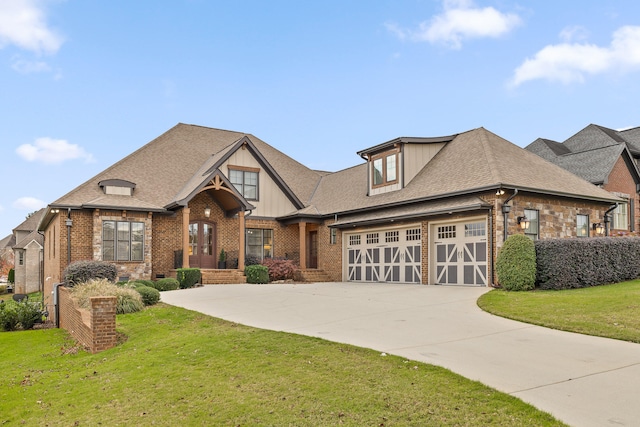 view of front facade featuring a front lawn and a garage