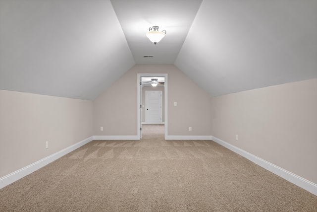 bonus room featuring carpet, ceiling fan, and lofted ceiling