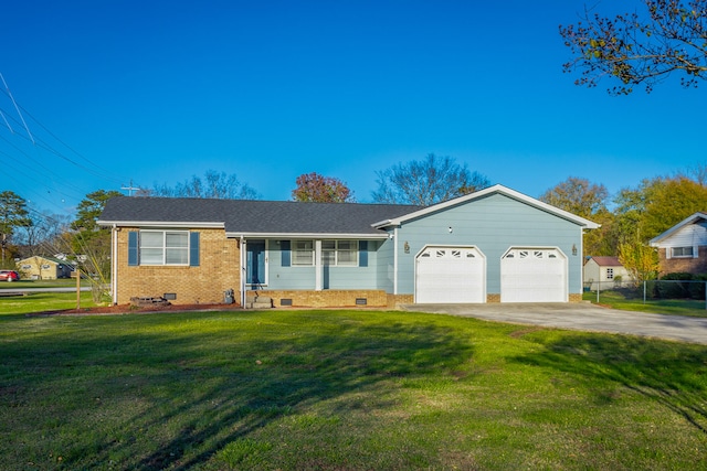 ranch-style home with a garage and a front lawn