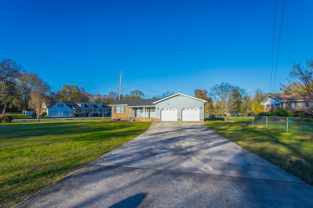 single story home with a front lawn and a garage