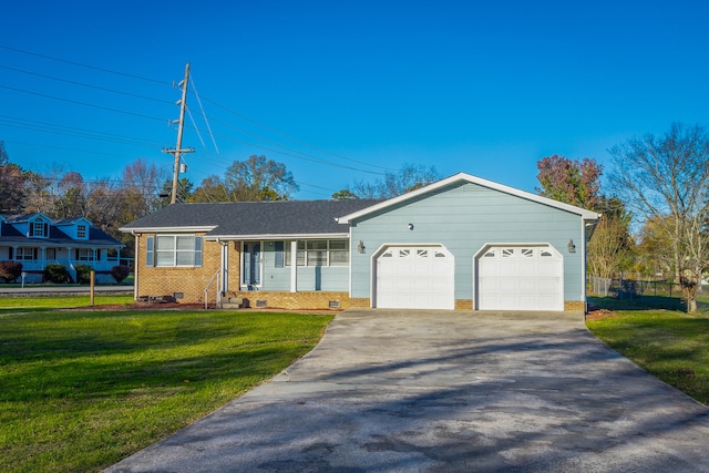 single story home with a garage and a front yard