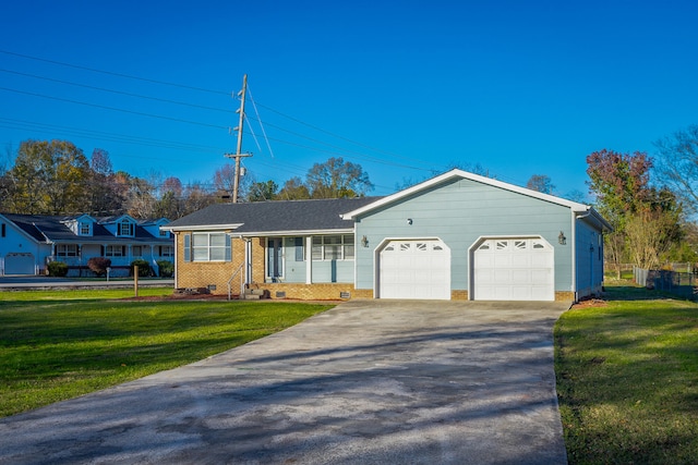 ranch-style house with a garage and a front yard