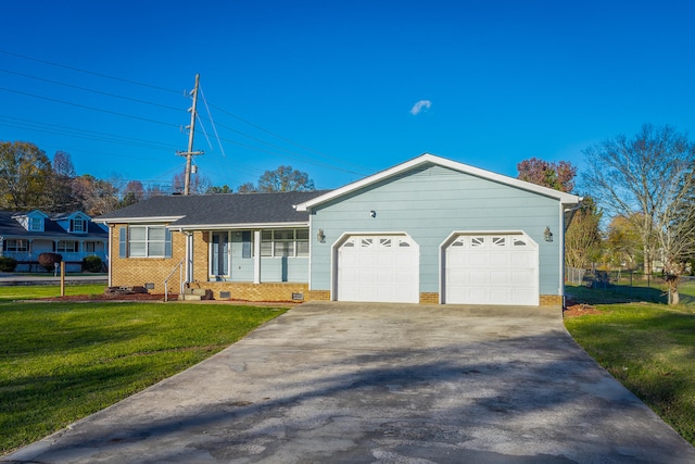 single story home featuring a garage and a front lawn