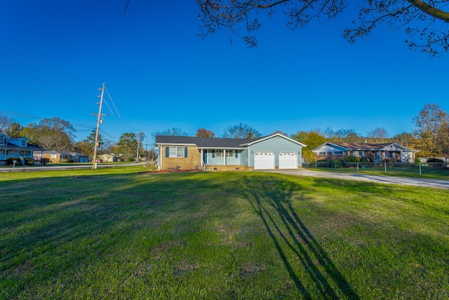 ranch-style house with a front lawn and a garage