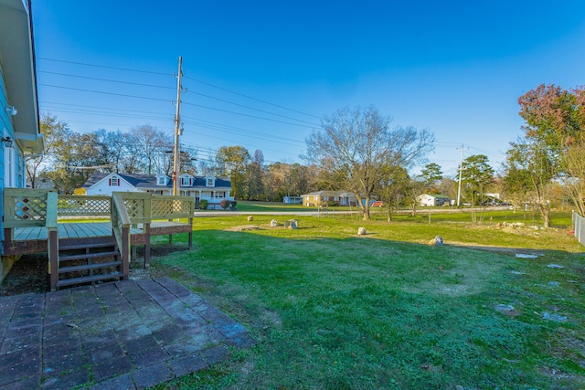 view of yard featuring a deck