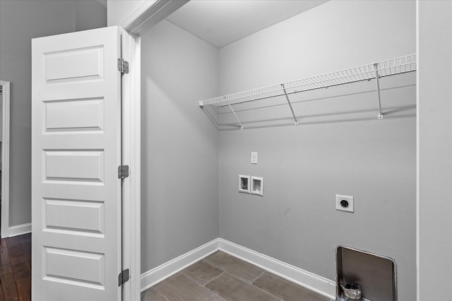 laundry room with hookup for a washing machine, dark hardwood / wood-style flooring, and electric dryer hookup