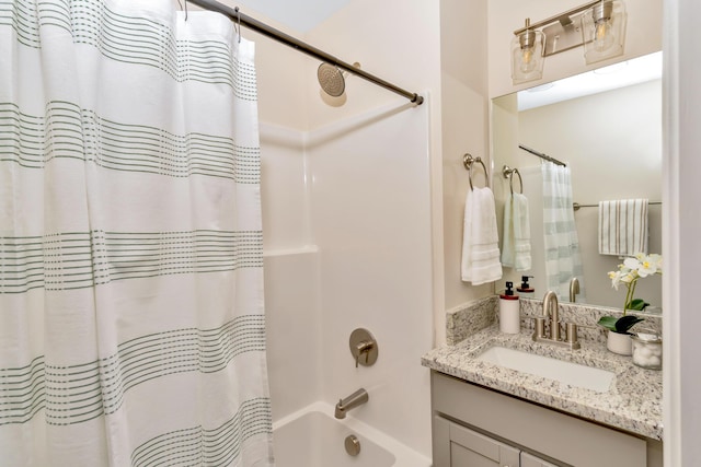 bathroom with vanity and shower / tub combo