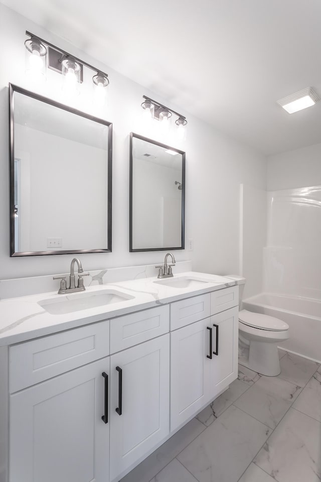 full bathroom with vanity, toilet, and tub / shower combination