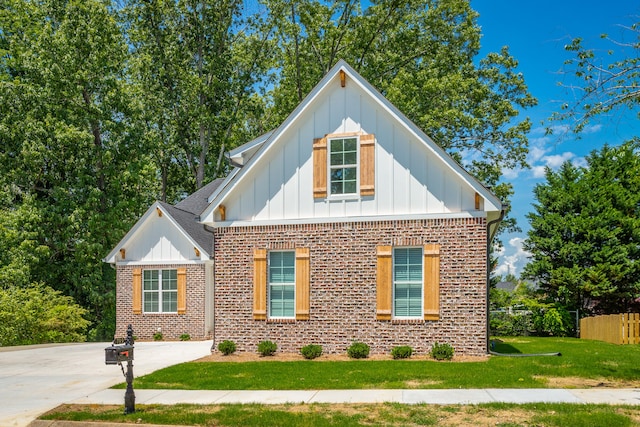 view of front of home with a front yard