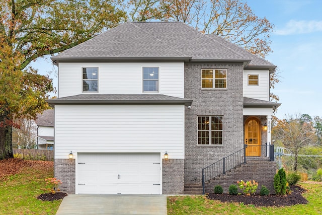 view of front of home with a garage