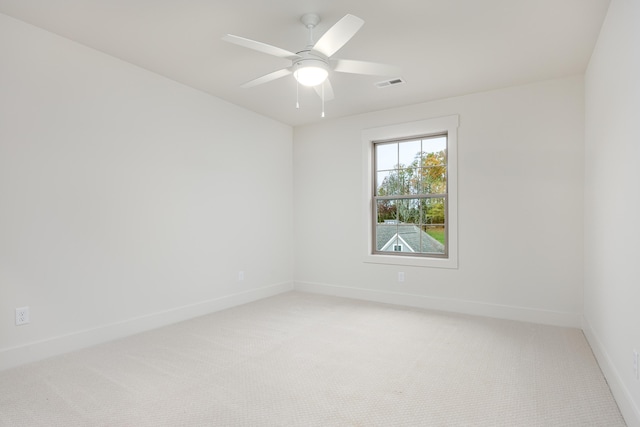 unfurnished room featuring carpet flooring and ceiling fan