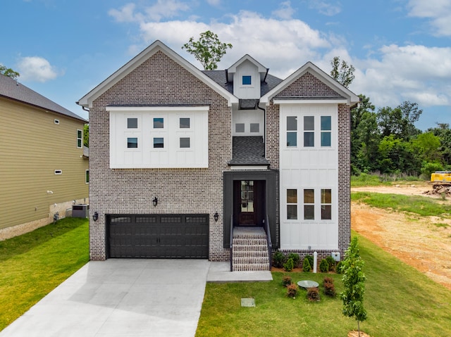 view of front of house with a front lawn, a garage, and central AC unit