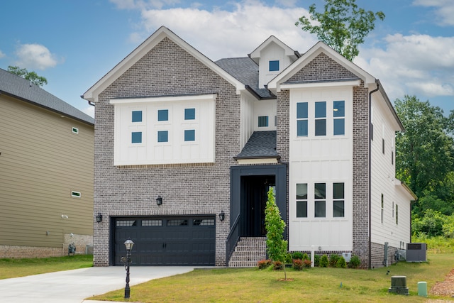 view of front facade featuring cooling unit, a front yard, and a garage