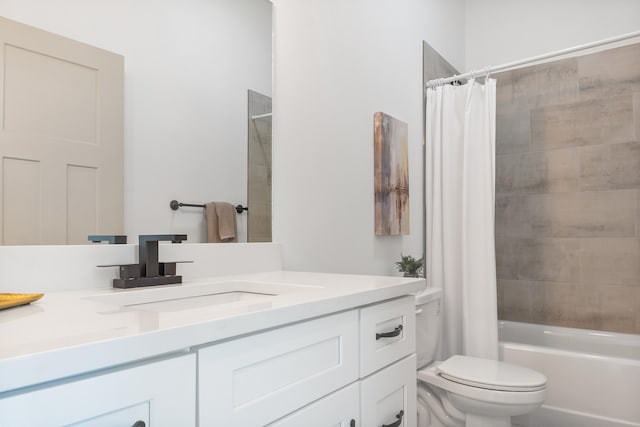 full bathroom with shower / bath combination with curtain, vanity, and toilet