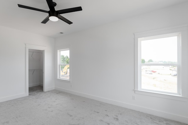 8340 Snowdrop Way, Ooltewah, TN 37363 - unfurnished bedroom with carpet floors, a closet, baseboards, and ceiling fan