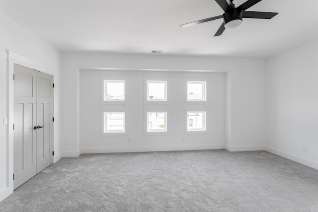 8340 Snowdrop Way, Ooltewah, TN 37363 - unfurnished bedroom featuring carpet floors, multiple windows, and baseboards