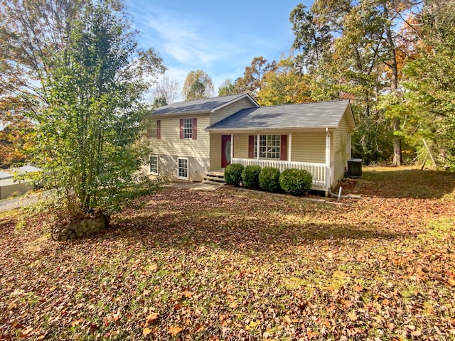 split level home featuring a porch