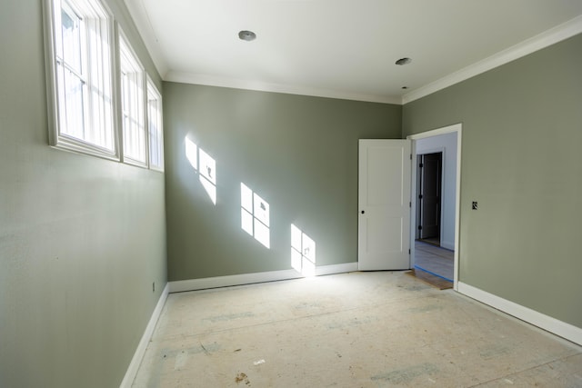 spare room with ornamental molding