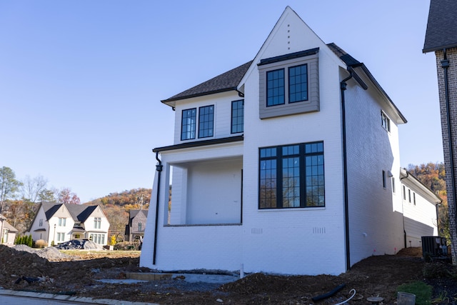 view of property exterior featuring central AC unit