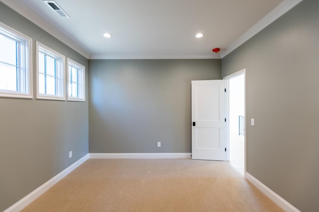 unfurnished room with light carpet, recessed lighting, and baseboards