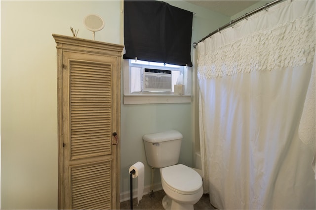 bathroom featuring cooling unit and toilet