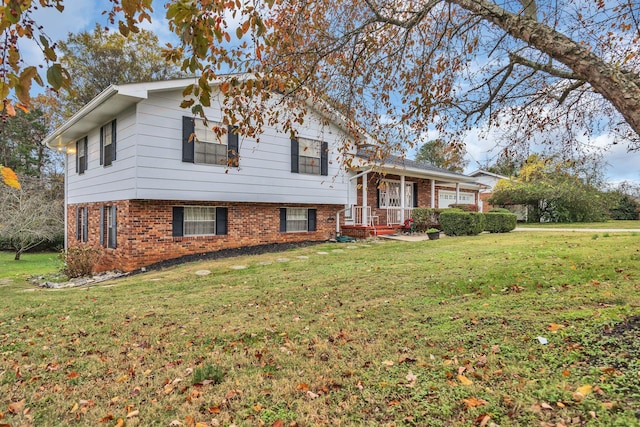 tri-level home with a front lawn